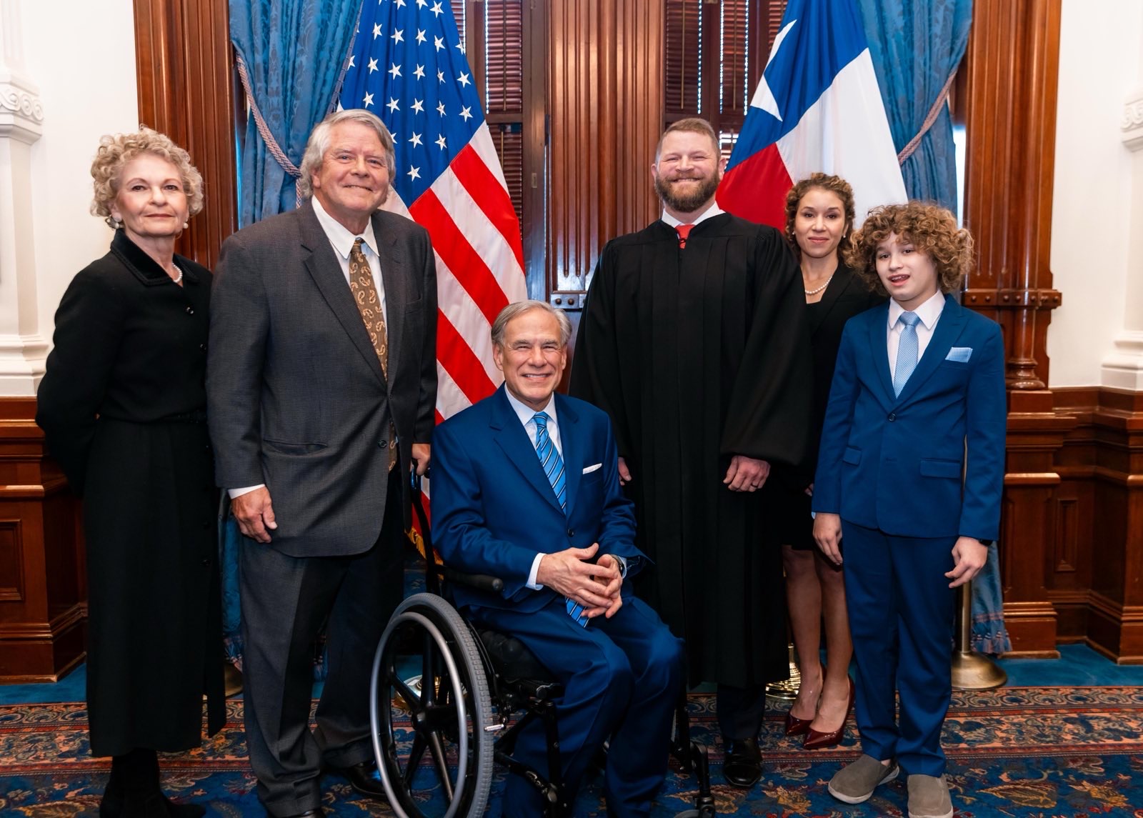 Justice Sullivan with extended family and Governor Abbott at the Texas State Capitol