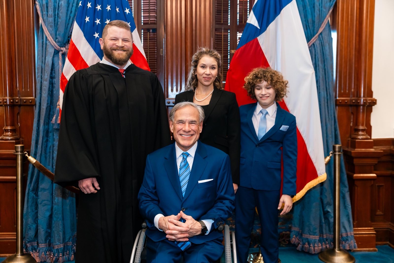 Justice Sullivan with his wife, son, and Governor Abbott at the Texas State Capitol